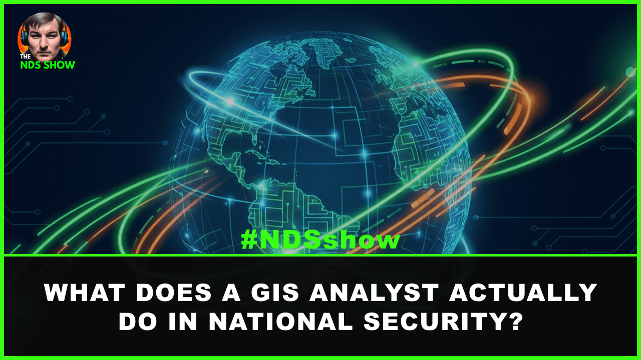 GIS analyst workstation with satellite imagery displays in a national security operations center
